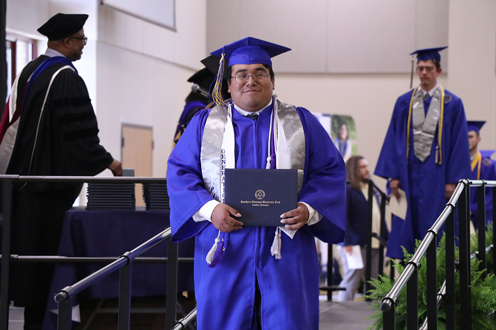 Young man at graduation ceremony