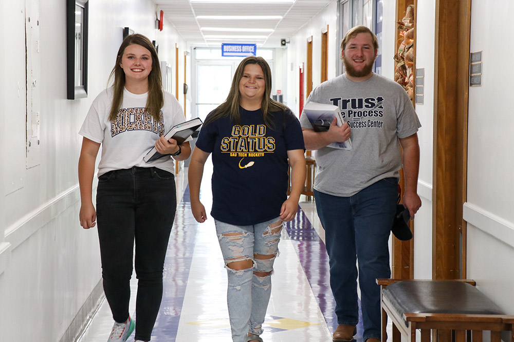 Students walking down hallway